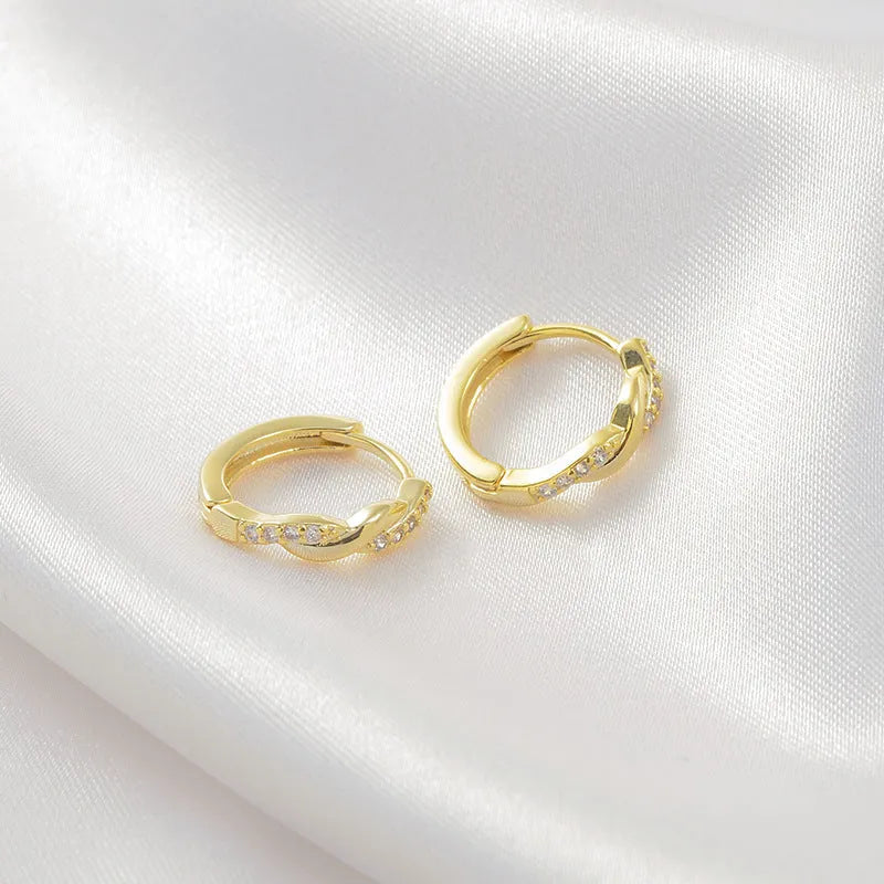 Geometric hemp rope earclip earrings in gold or silver copper with diamond treatment and round elements