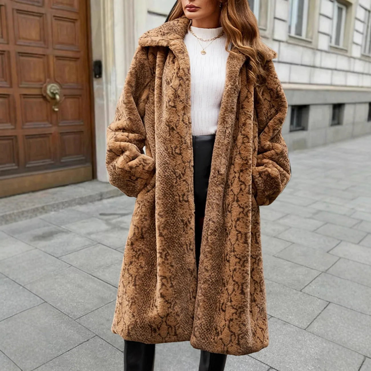 Women's brown leopard print over-the-knee plush faux fur coat on a hanger