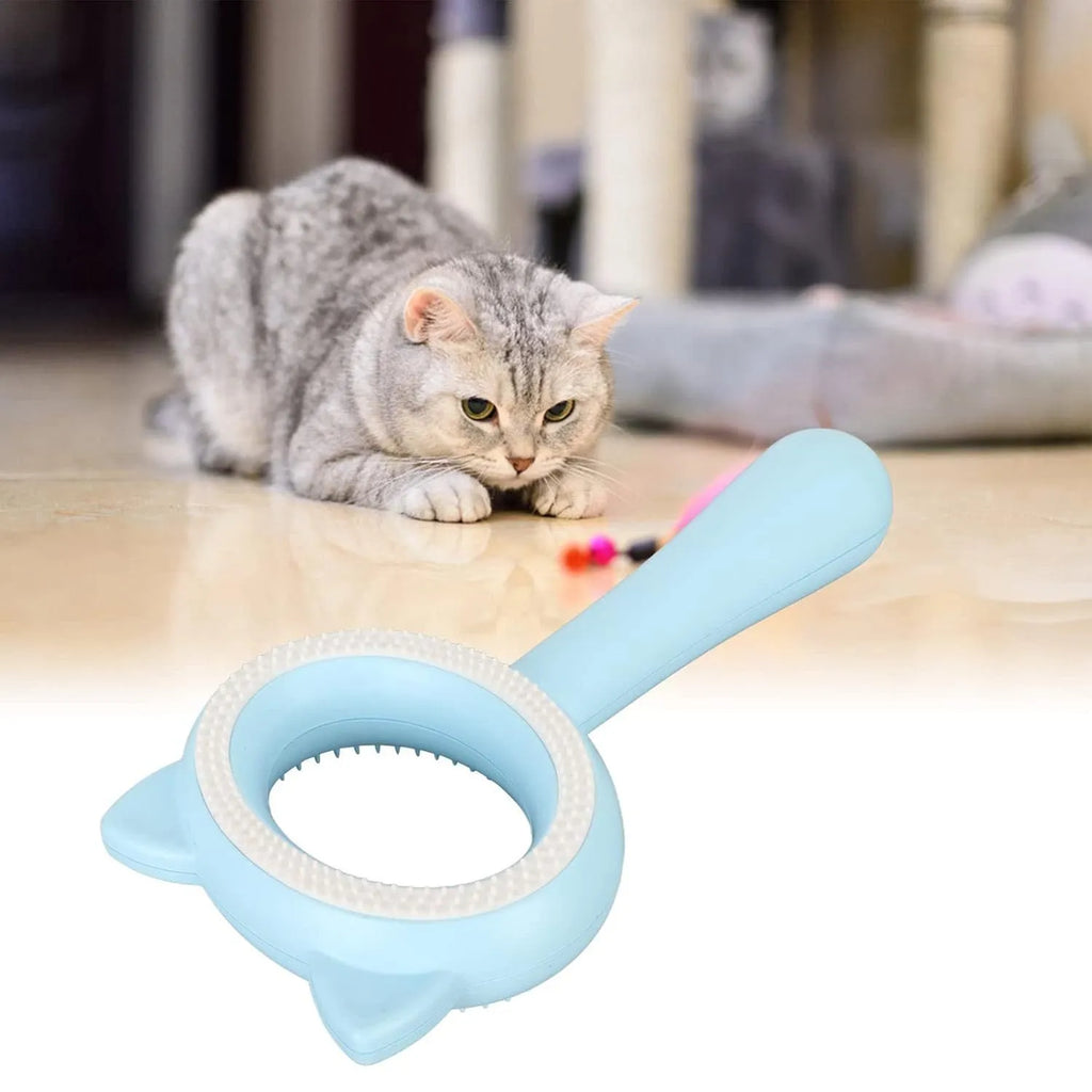 Blue and white double-sided pet grooming brush for cats and dogs on a white background.