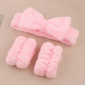 Facial brush and coral fleece hair band set in purple colour with plastic handle and nylon bristles