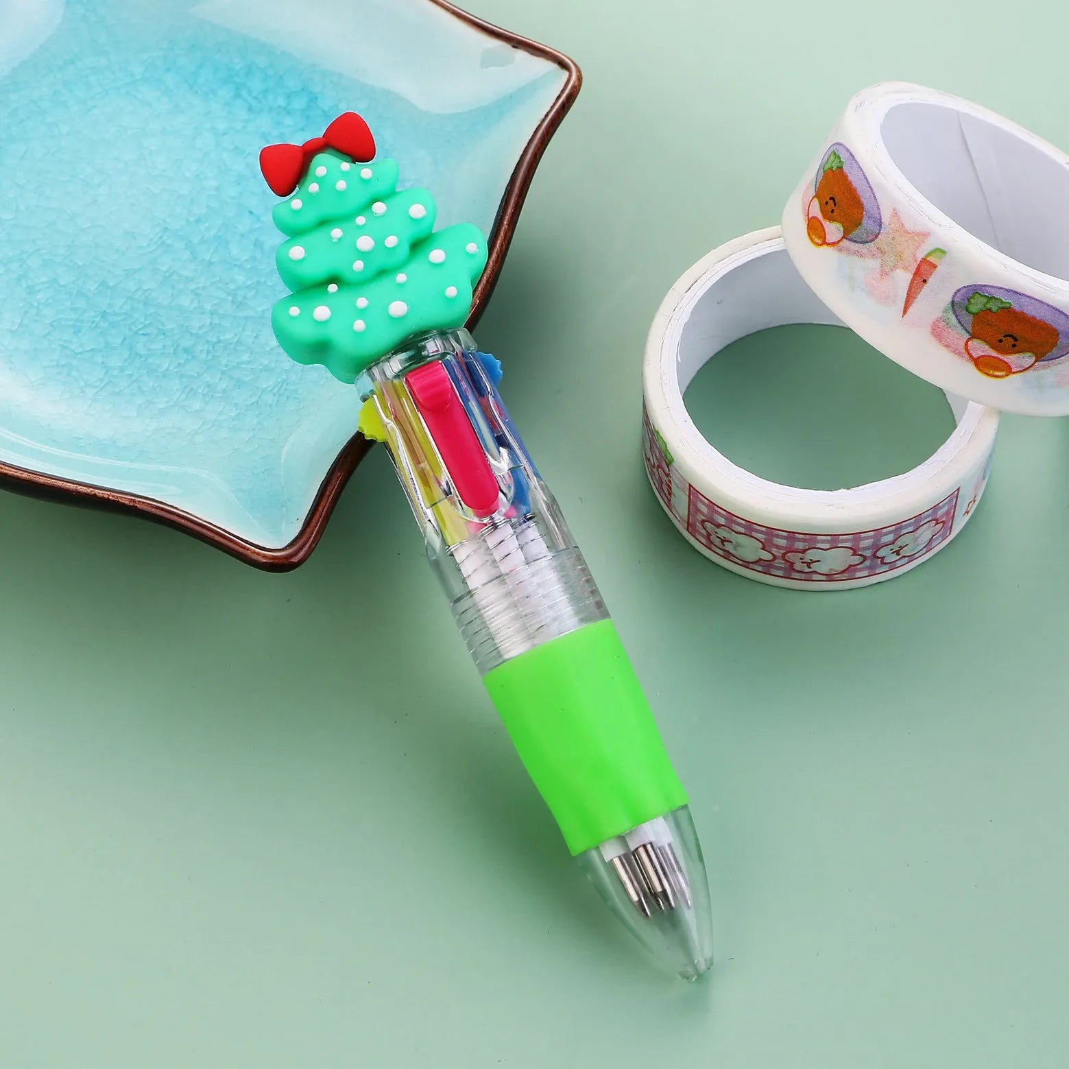 Compact 11cm Christmas four-colour ballpoint pen with press mechanism in festive designs