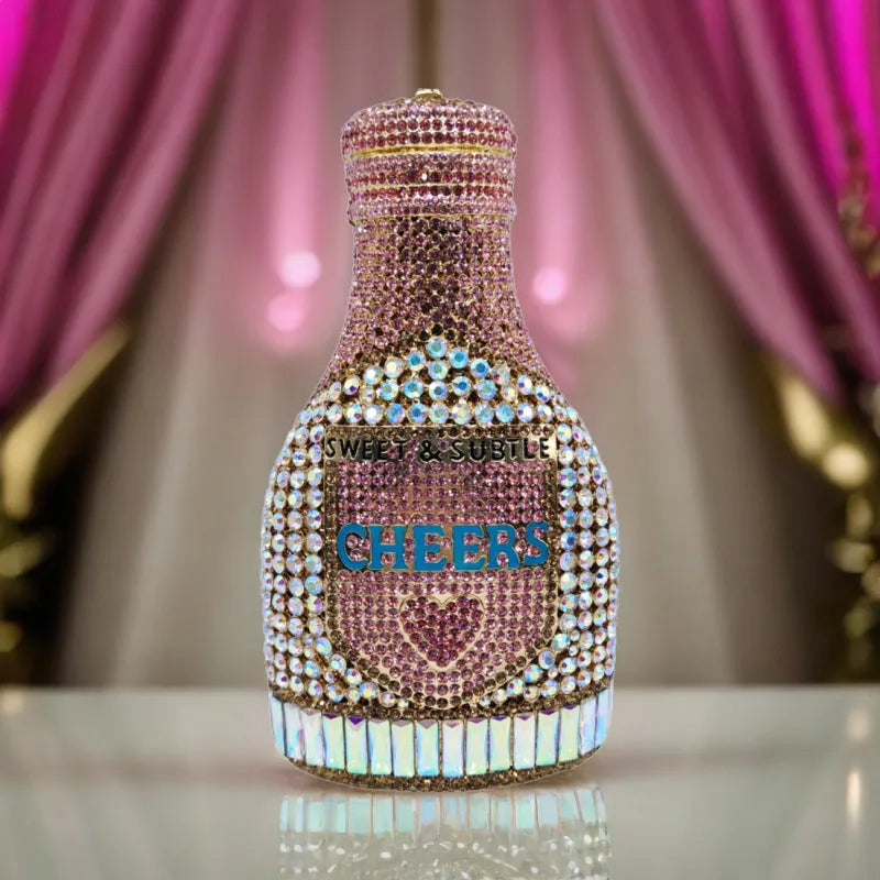 Gold champagne bottle-shaped rhinestone evening clutch bag with hard alloy construction.