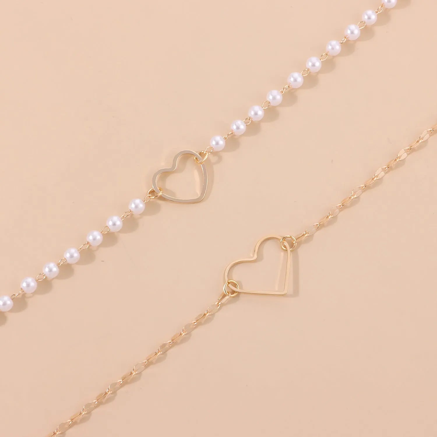 Gold heart-shaped zinc alloy pendant necklace on adjustable chain