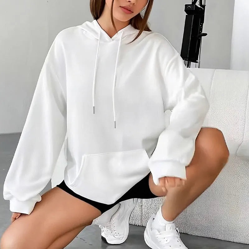 Women's loose fit grey sweatshirt with front drawstring detail and long sleeves on a hanger