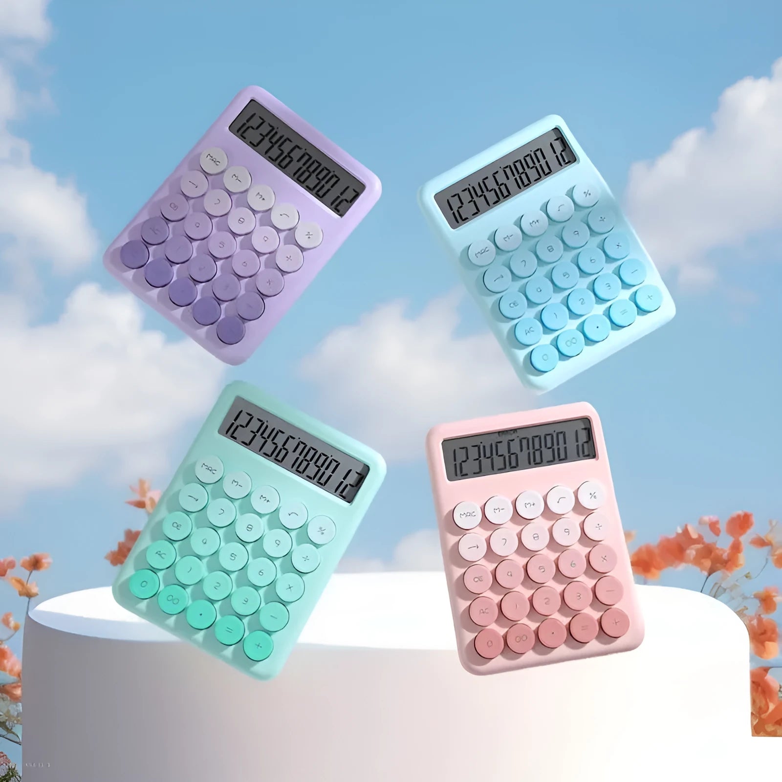 Gradient colour desk calculator showing violet, cherry blossom, blue and green shade options