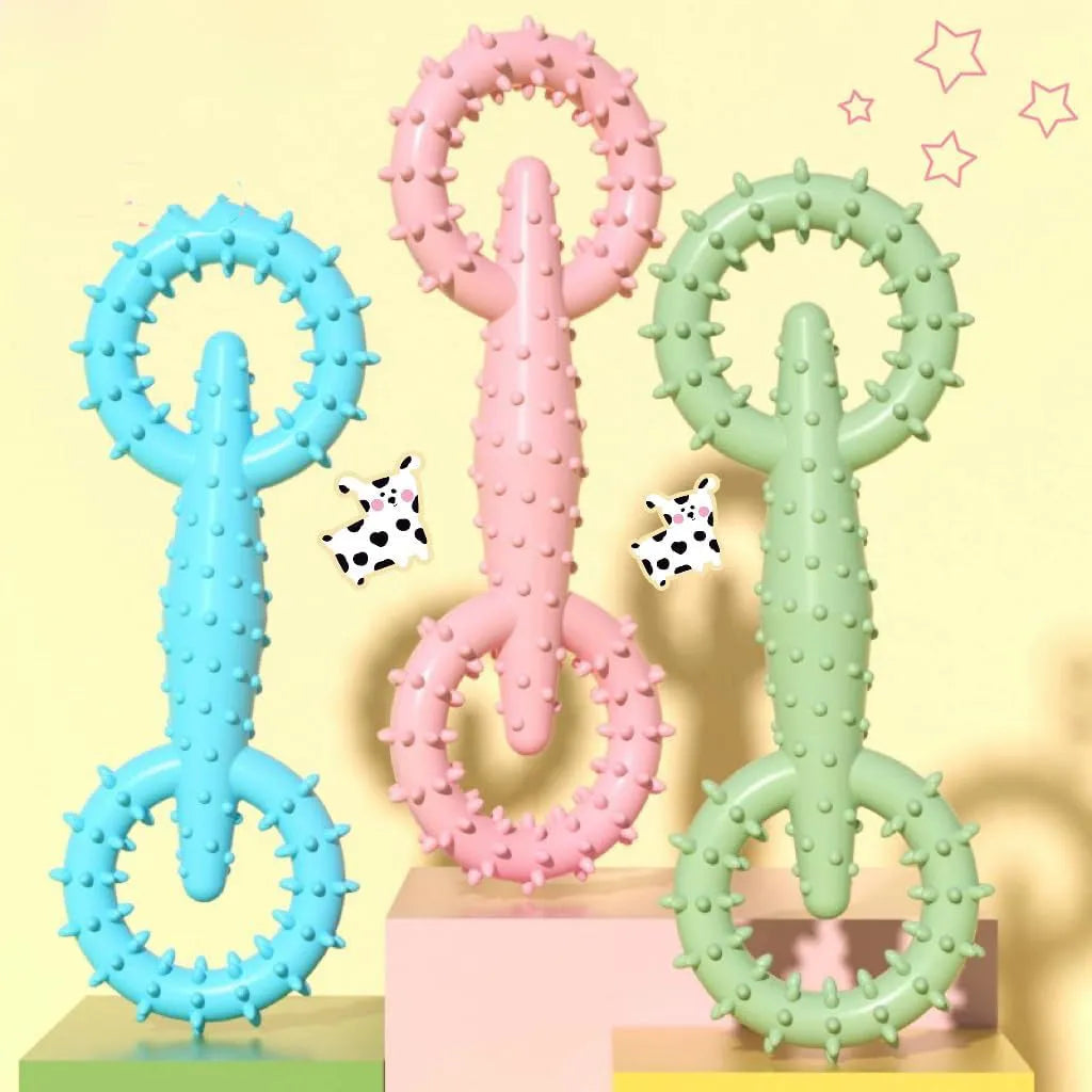 Blue TPR dog chew toy ring for puppy teething on white background