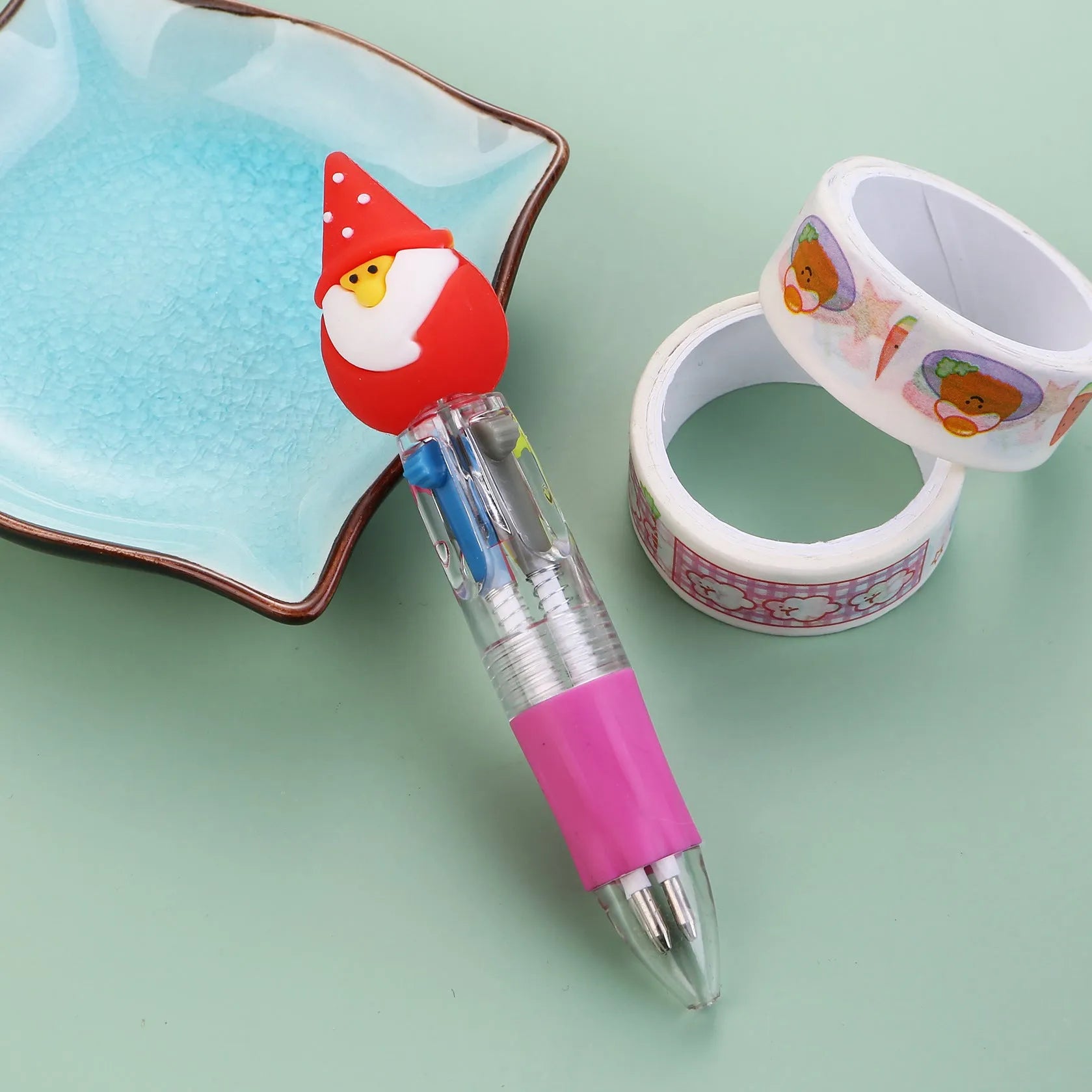 Compact 11cm Christmas four-colour ballpoint pen with press mechanism in festive designs