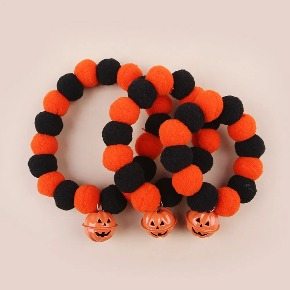 Orange Halloween pumpkin cat collar with breakaway safety buckle on adjustable polyester webbing