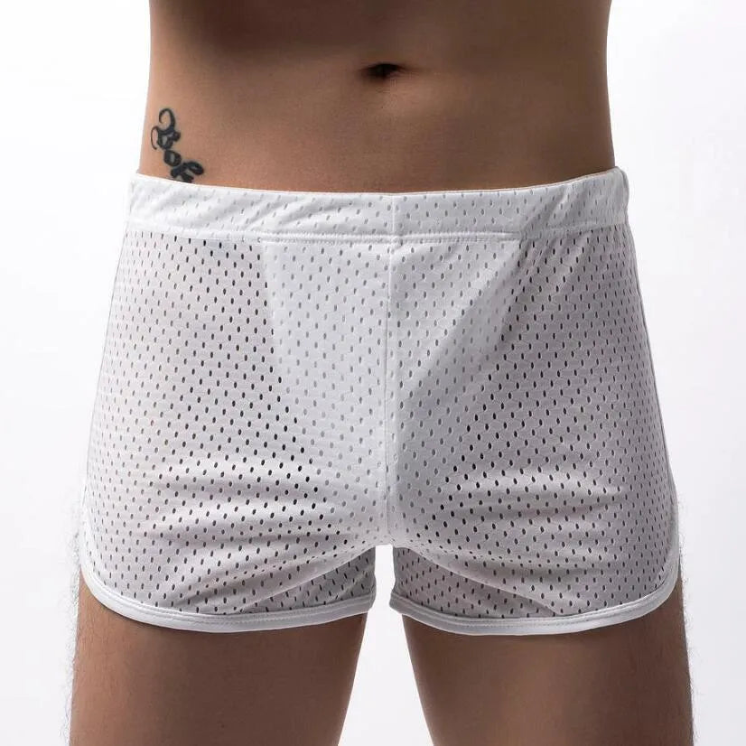 Men's three-point boxers in black, gray, and blue showing breathable knitted cotton nylon fabric and mid-waist fit.