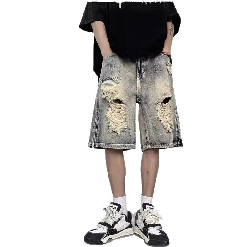Blue retro denim shorts with tattered detailing and wide leg cut for summer wear