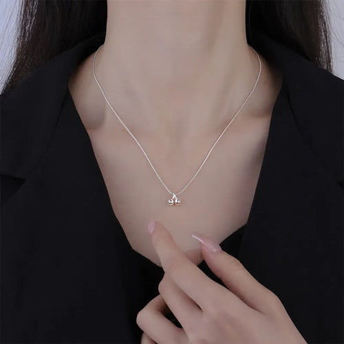 Silver cherry necklace for women with adjustable snake bone chain and Korean-style fruit pendant.