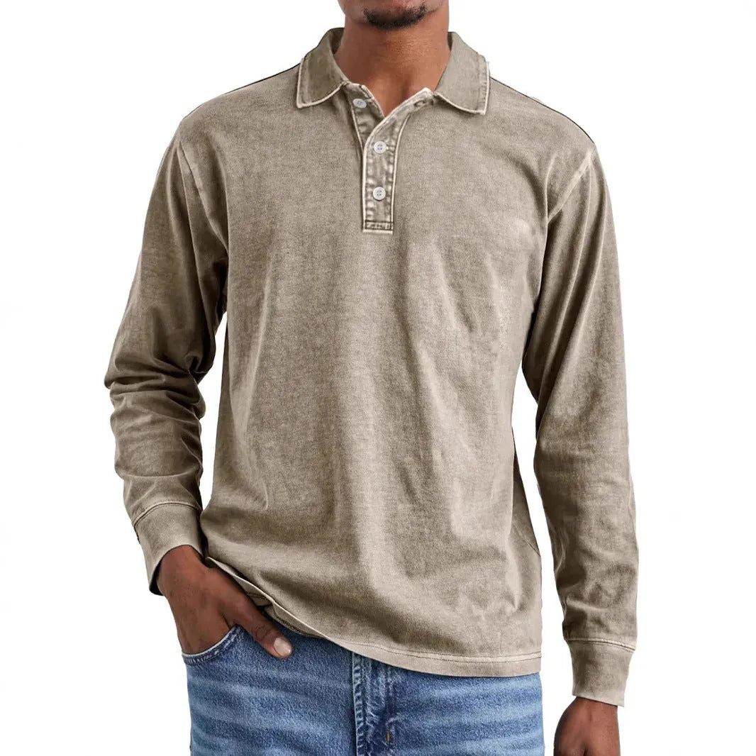 Man wearing a retro washed distressed cotton lapel long sleeve polo shirt in army green.