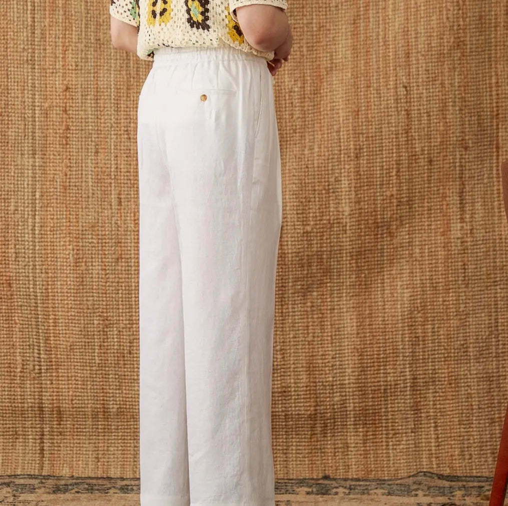 Linen high waist trousers with elasticated waistband in straight-leg cut