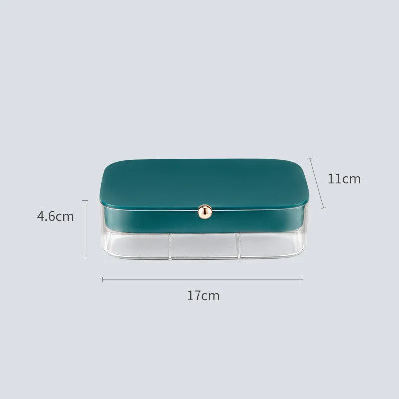 Green minimalist jewelry storage box with multiple layers for organised accessory storage