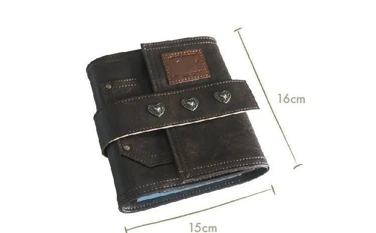 Brown PU cover A7 notebook with metal buckle closure showing loose-leaf binding and raw wood pulp pages
