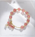 Pink strawberry quartz heart-shaped women's bracelet with natural pearl accents