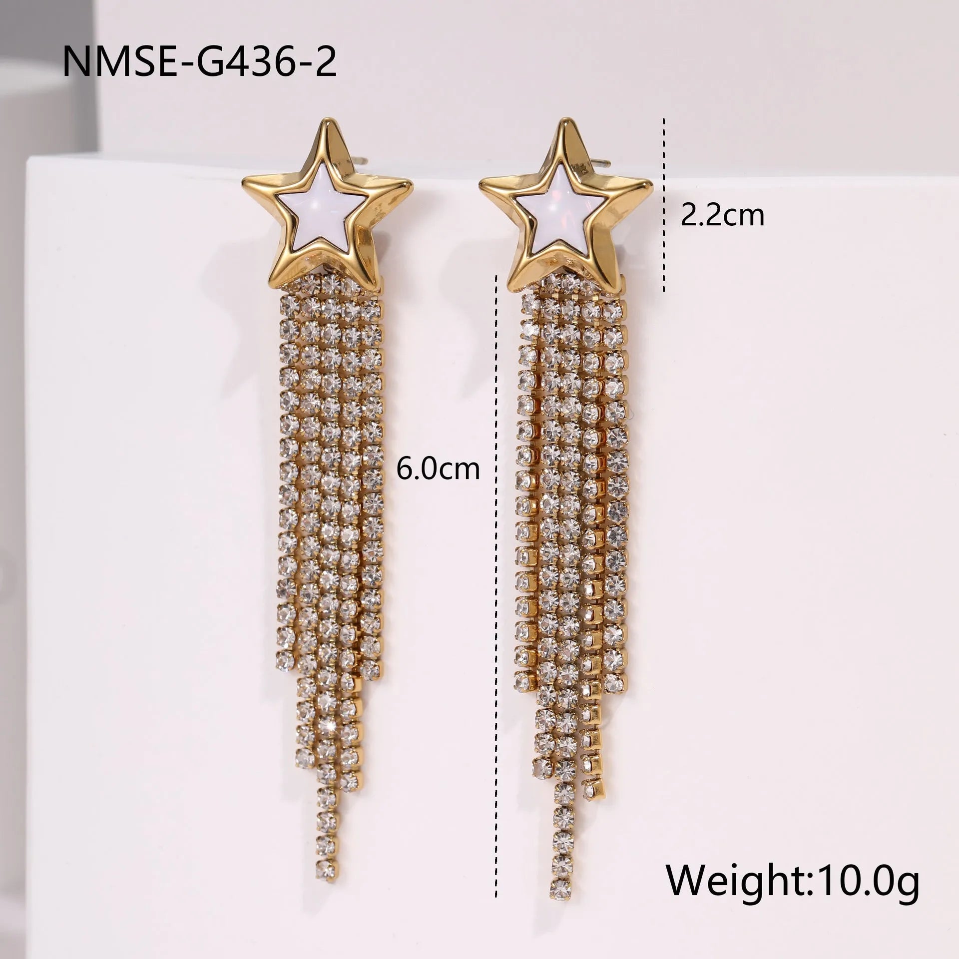 Stainless steel tassel earrings with 18K gold electroplated finish and diamond tips in heart and star shapes