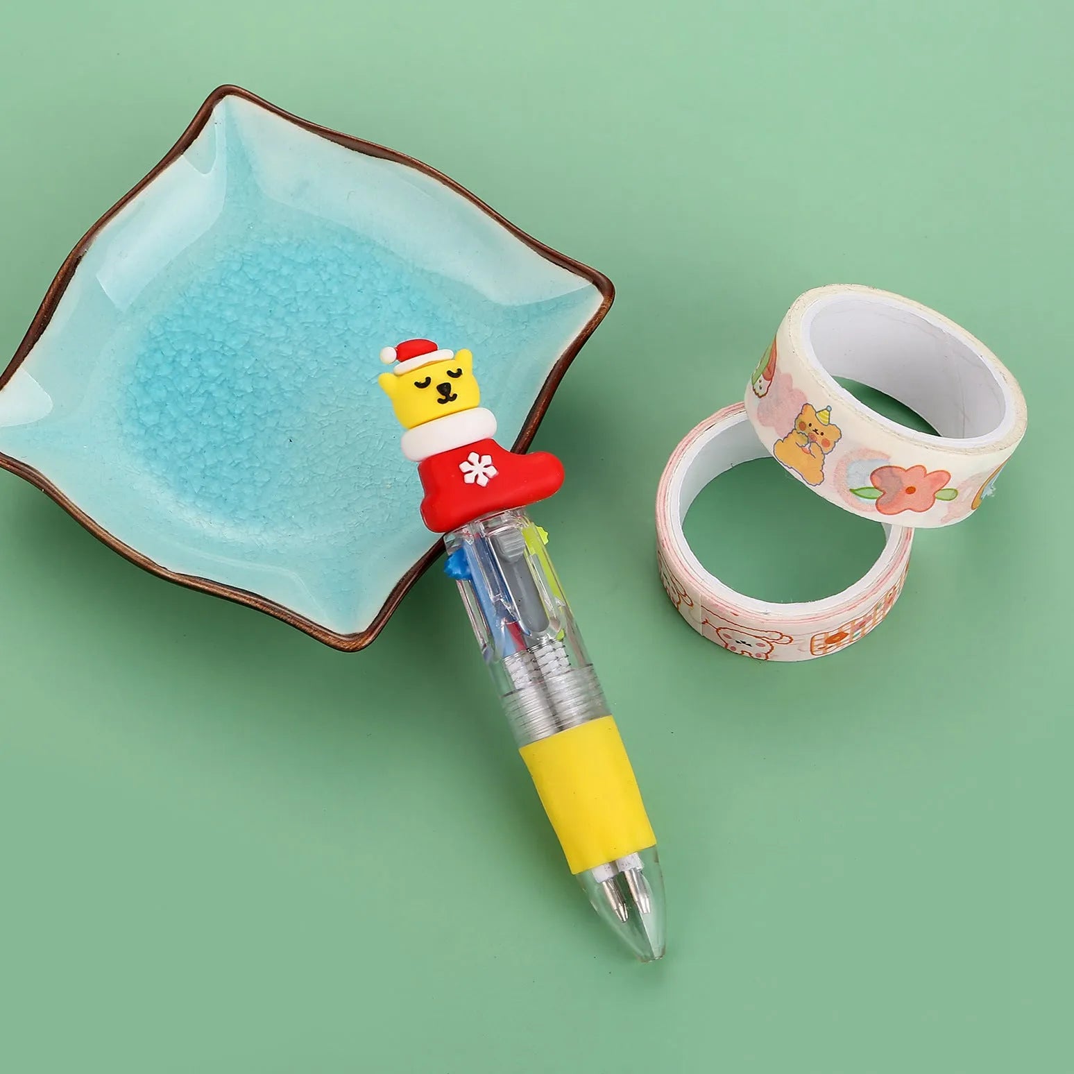Compact 11cm Christmas four-colour ballpoint pen with press mechanism in festive designs