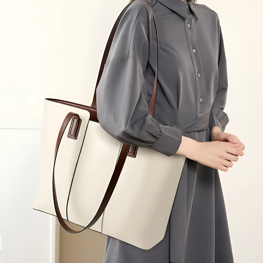Women's black genuine leather crossbody commuter bag with large capacity and internal organisation compartments