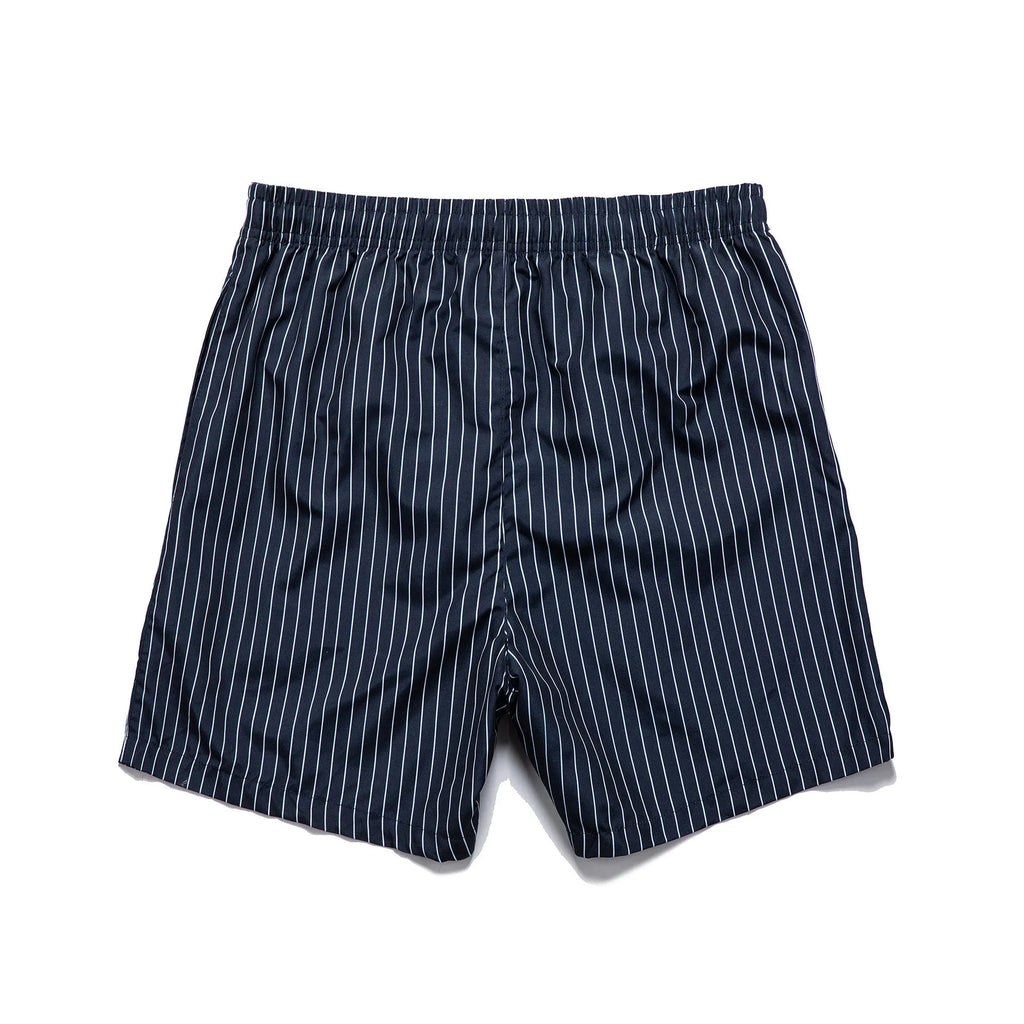 Polyester fibre beach shorts with digital printed striped triangle lining in straight leg style