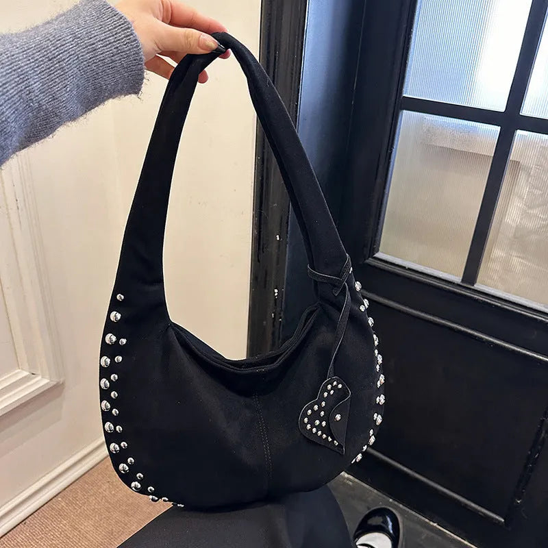 Soft plush retro style tote handbag for women in a choice of colours, shown as a strapless design.