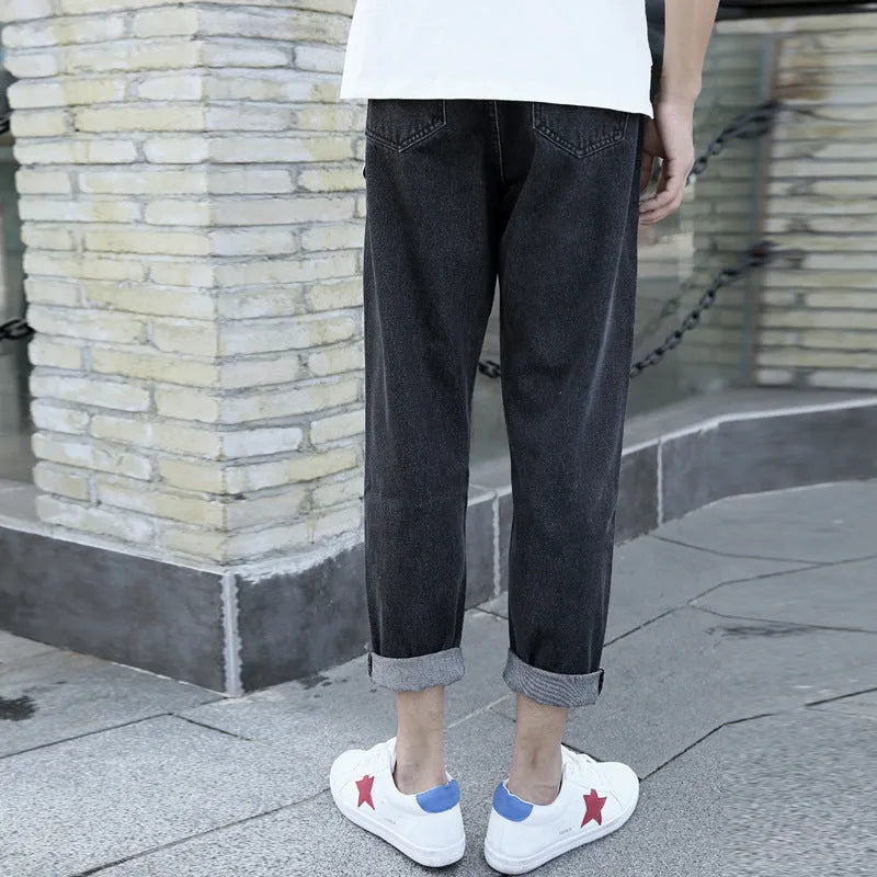 Men's straight-leg jeans in cotton with loose small harem cut in black or blue colour