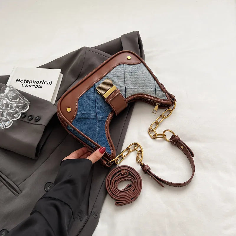 Brown denim women's shoulder bag with diamond mesh and chain details showing internal mobile phone pocket