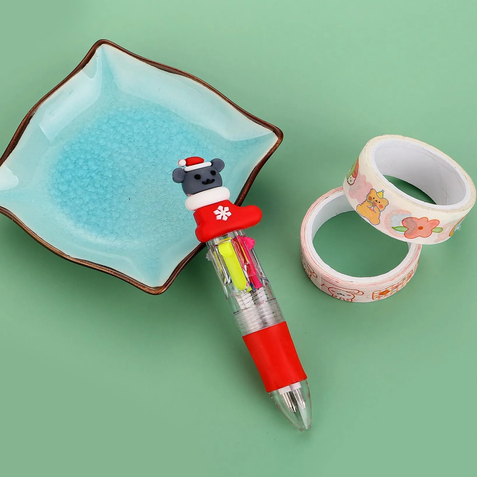 Compact 11cm Christmas four-colour ballpoint pen with press mechanism in festive designs