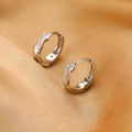 Geometric hemp rope earclip earrings in gold or silver copper with diamond treatment and round elements