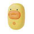 White and yellow silicone steam pet brush for grooming dogs and cats with a water tank.