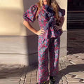 Floral print tie-neck leisure suit with puff sleeves and matching trousers for commuting wear