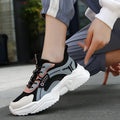 Women's casual mesh sports shoes with a thick PU sole and buckle detail