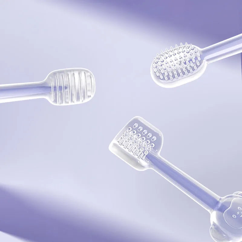 Pet toothbrush with flexible silicone brush head in blue, green, and purple colours for cat and dog dental care
