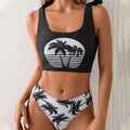Women's coconut print bikini swimsuit with lace-up styling on a hanger