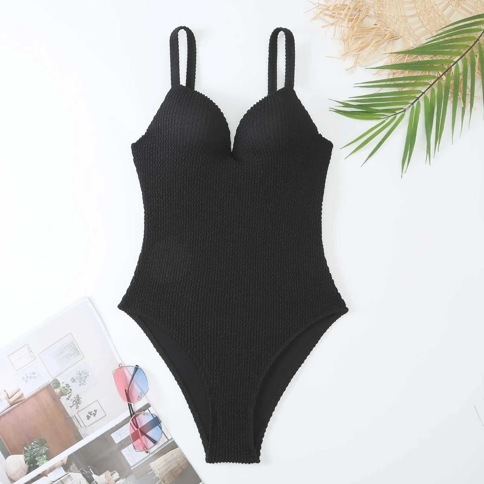 Women's sleeveless one-piece swimsuit with sunken stripe pattern in multiple colour options