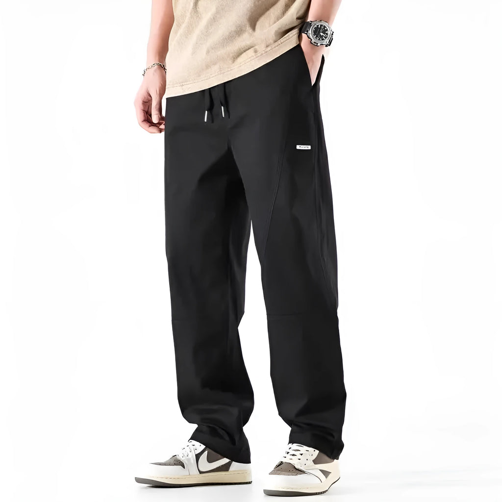 Women's milky white cotton wide-leg casual trousers with an antibacterial feature on a hanger.