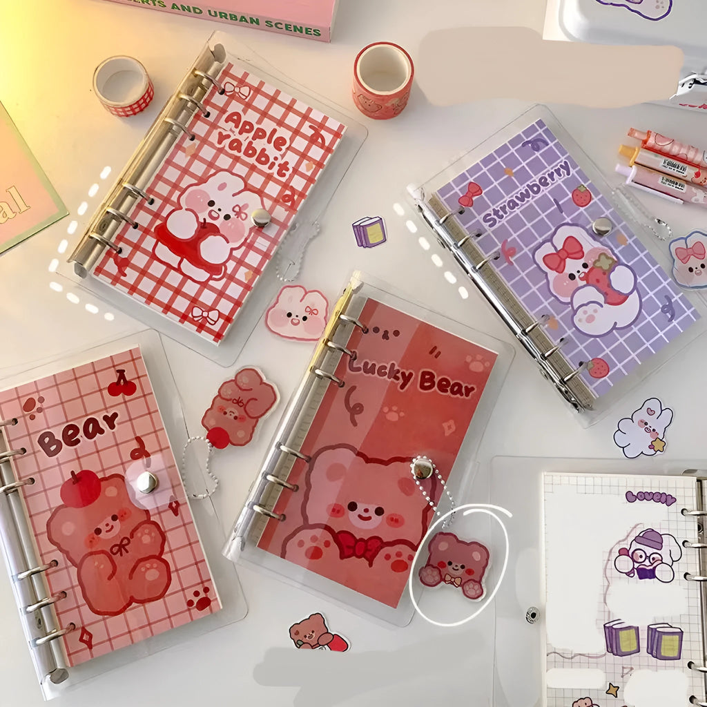 A6 girl heart themed loose leaf coil notebook with decorative cover, showing 6-hole binding.