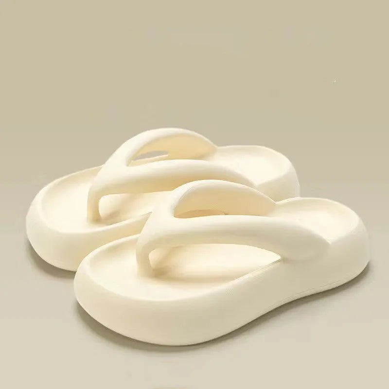 Solid colour thick-soled EVA flip-flops with a bow on the strap, shown on a white background.
