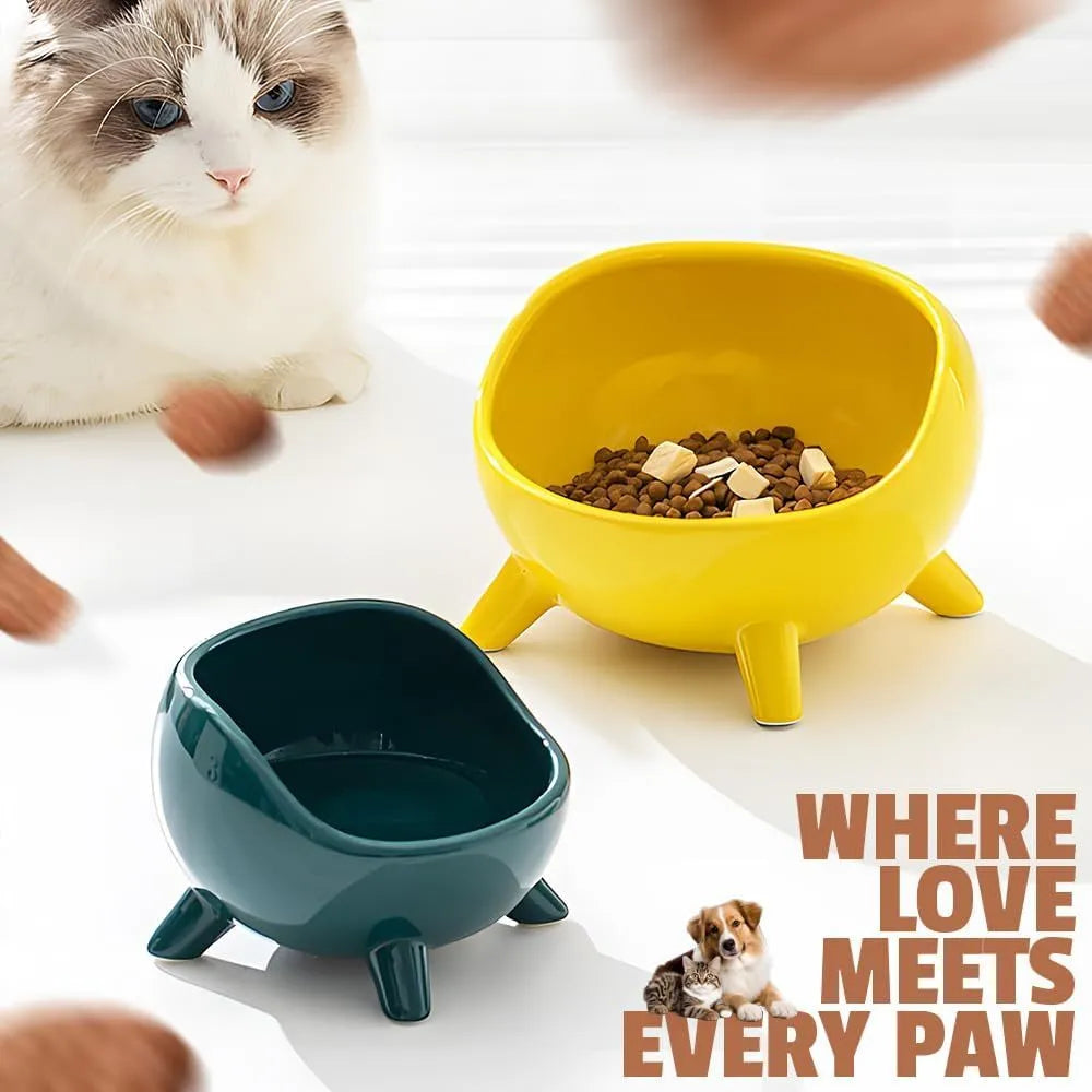 Green ceramic pet bowl with four-legged stable base and wide-mouth design