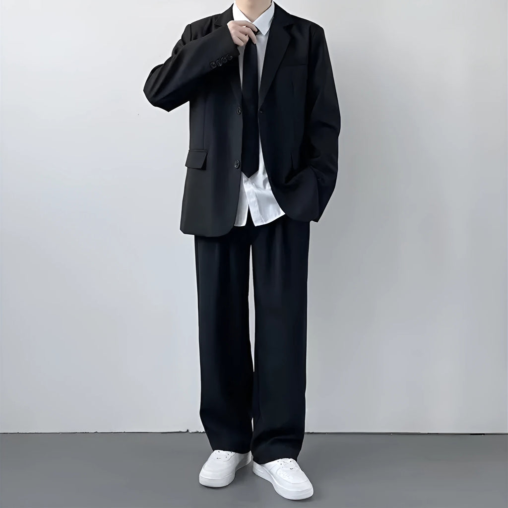 Plus size men's college style suit set with jacket, trousers, white shirt, and tie in loose fit