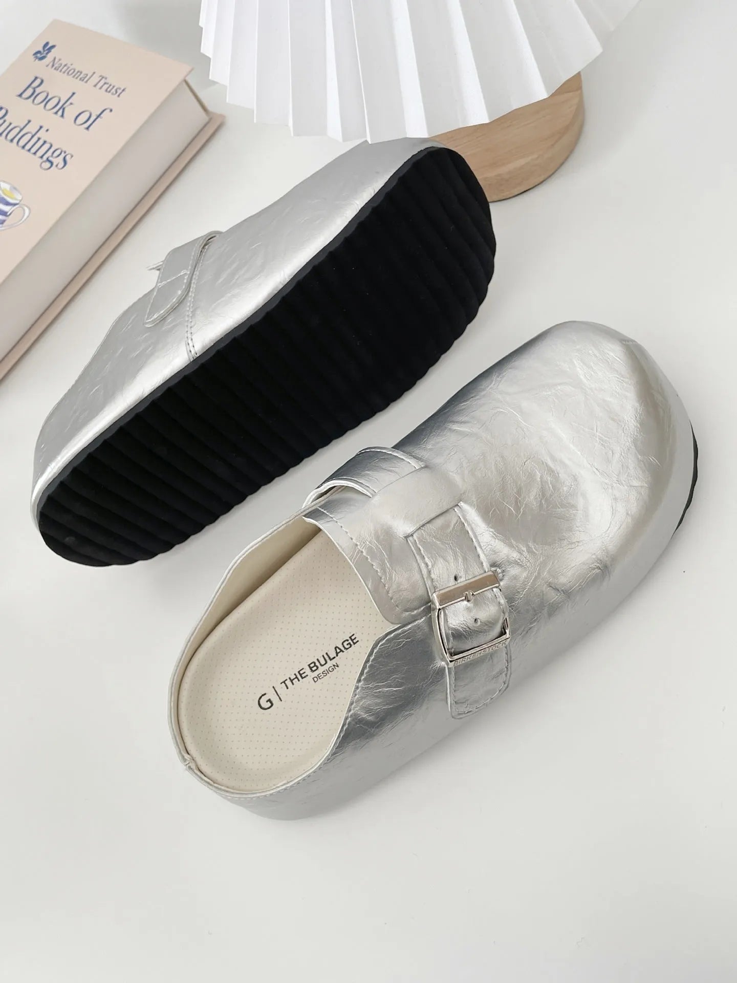 Flat buckle casual sneakers in yellow, round toe, PU upper, on a white background.