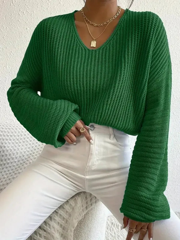 Women's solid colour long sleeve loose pullover in black, pink, green, blue, or red.