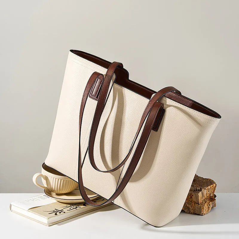 Women's black genuine leather crossbody commuter bag with large capacity and internal organisation compartments