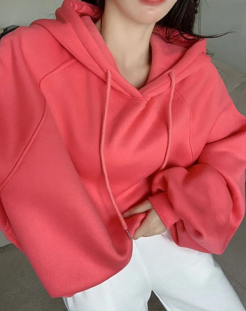 Watermelon red women's sleeveless hooded pullover sweater made from mulberry silk fabric.