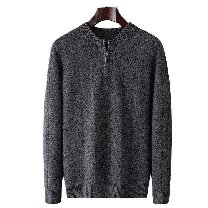 Man wearing a beige pure wool loose fit sweater with a diamond lattice pattern and a half-zip neck.
