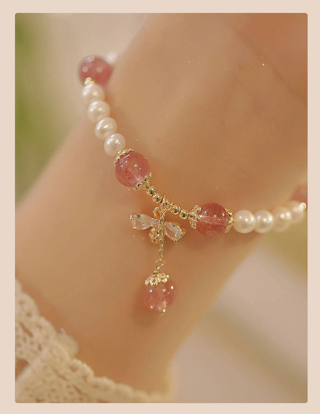Women's crystal bracelet with strawberry quartz pearls and bow design
