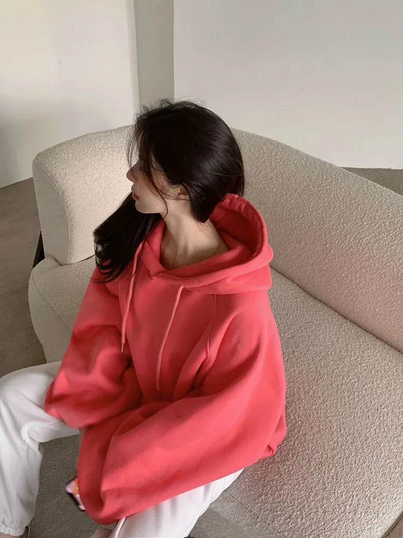 Watermelon red women's sleeveless hooded pullover sweater made from mulberry silk fabric.