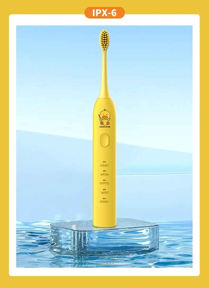 Yellow rechargeable smart electric toothbrush with soft bristle head and USB charging cable