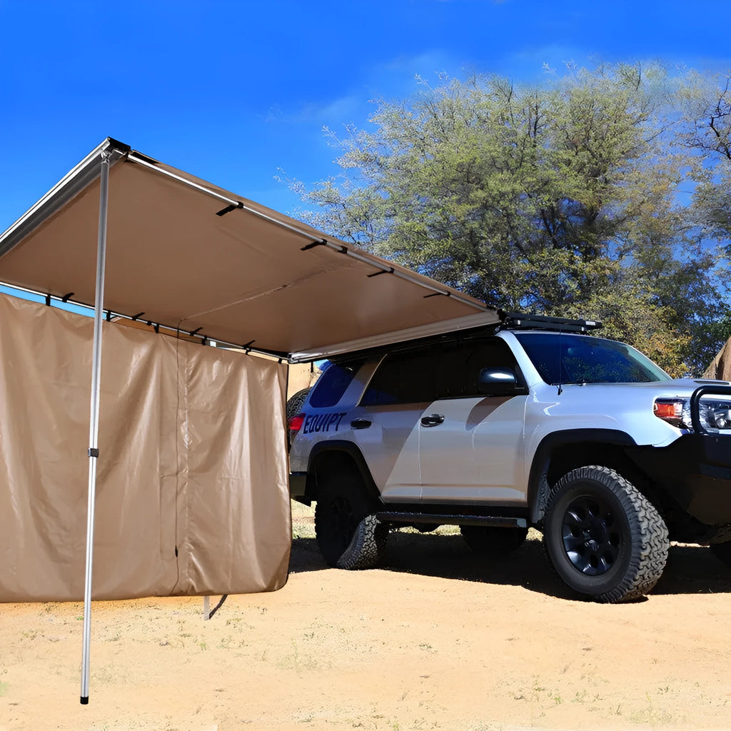 Camouflage car sunshade tent with aluminium poles set up outdoors, showing two-room interior.