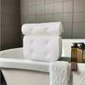 White bathtub pillow with 4D mesh and suction cups on a 3D material surface